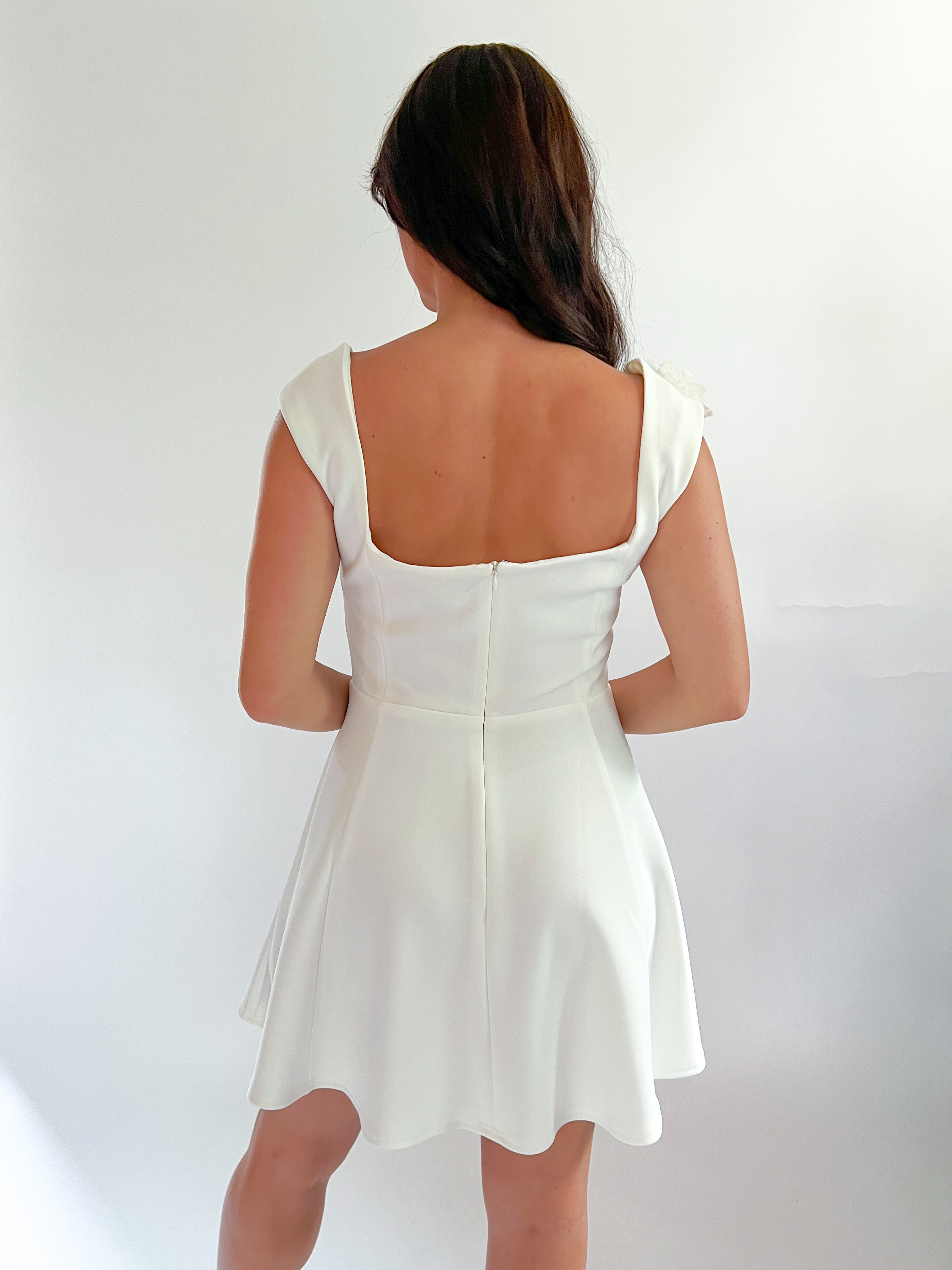 a woman in a white dress