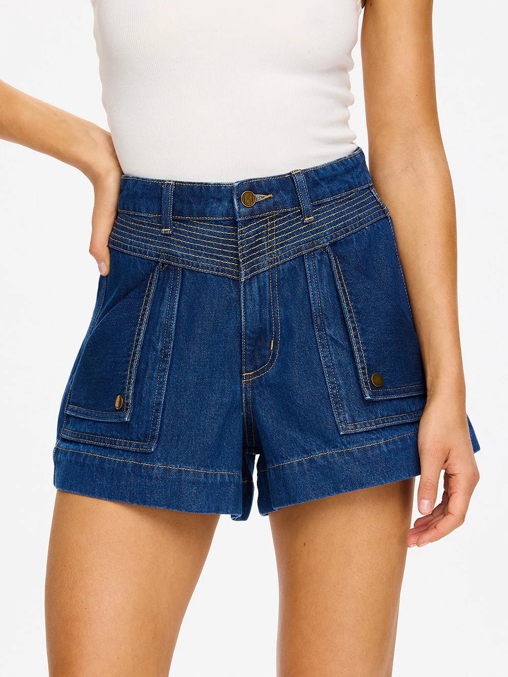 Indigo denim high-rise shorts with antique brass hardware and contrast stitching