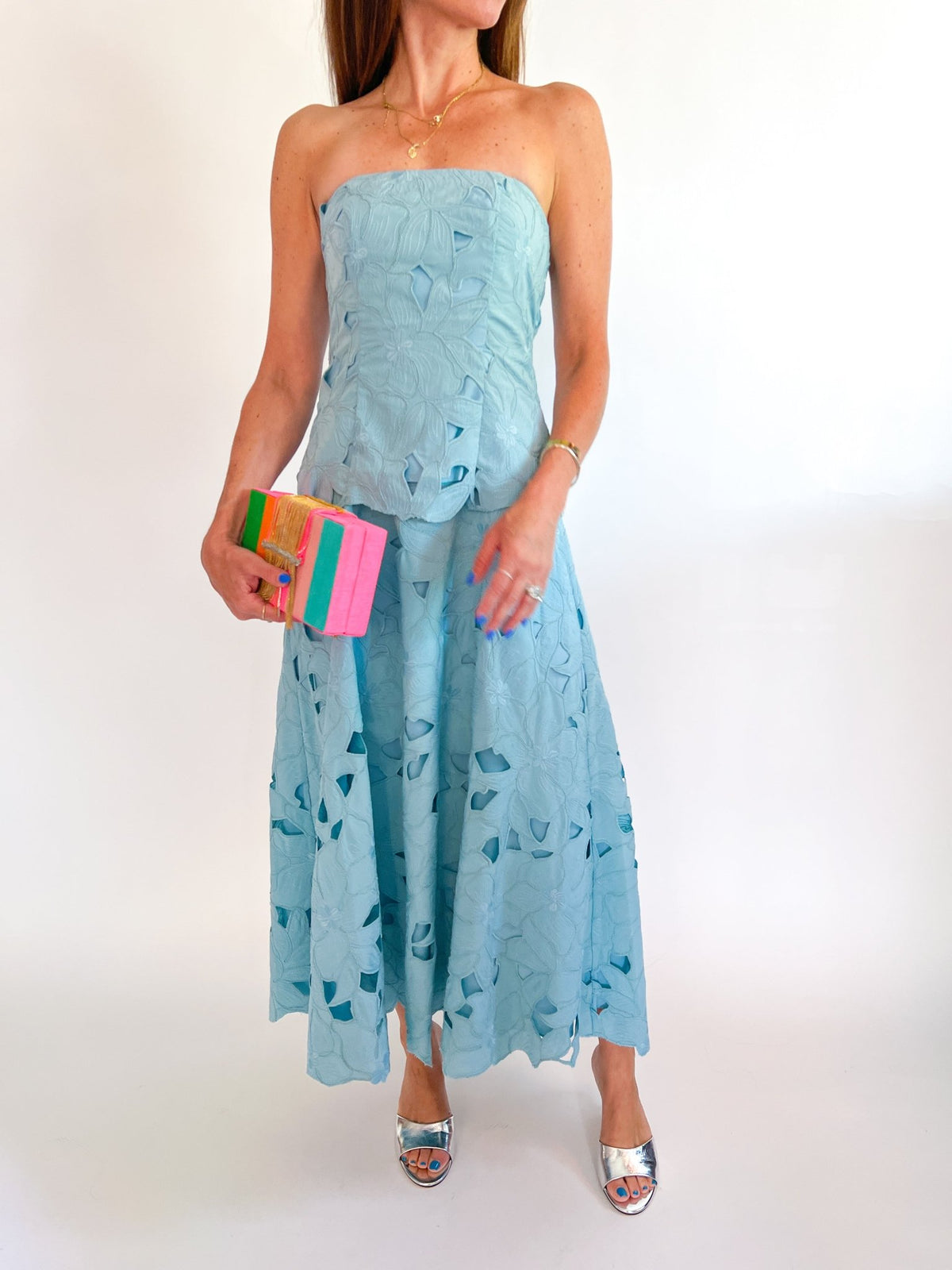 Blue floral strapless midi dress with peplum waist