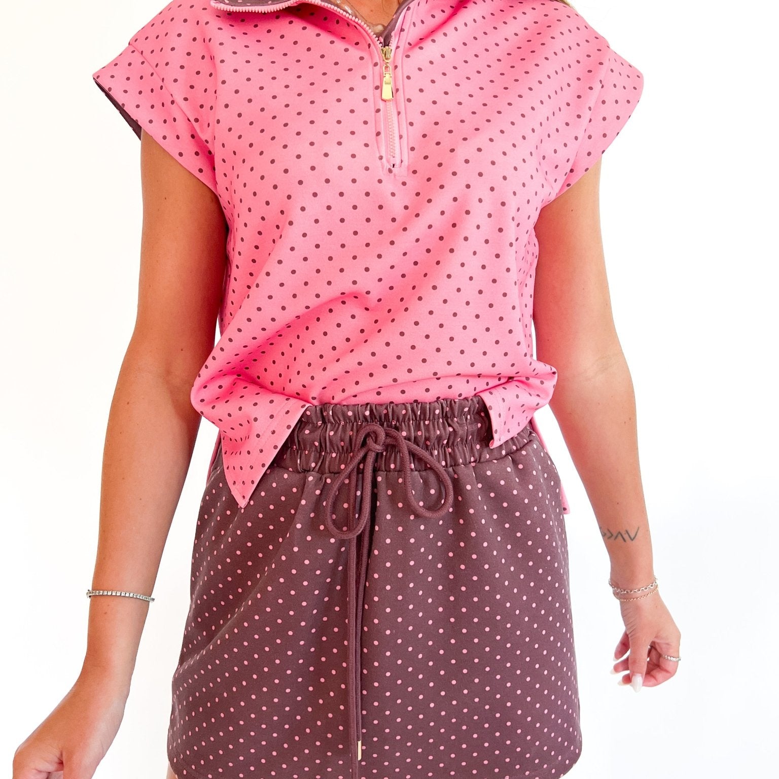 Multi polka dot quarter zip top