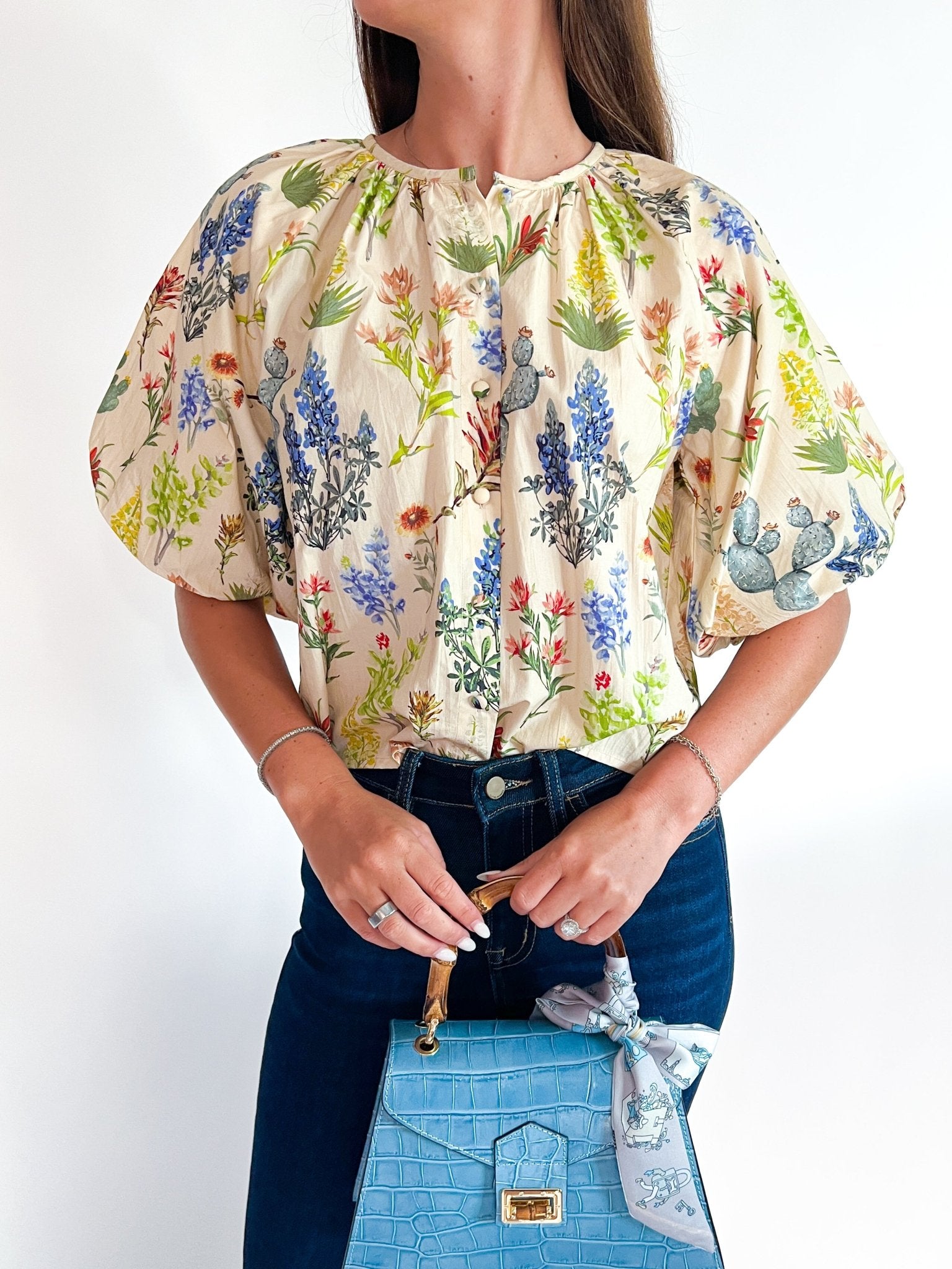 Tan floral top with chaparral print