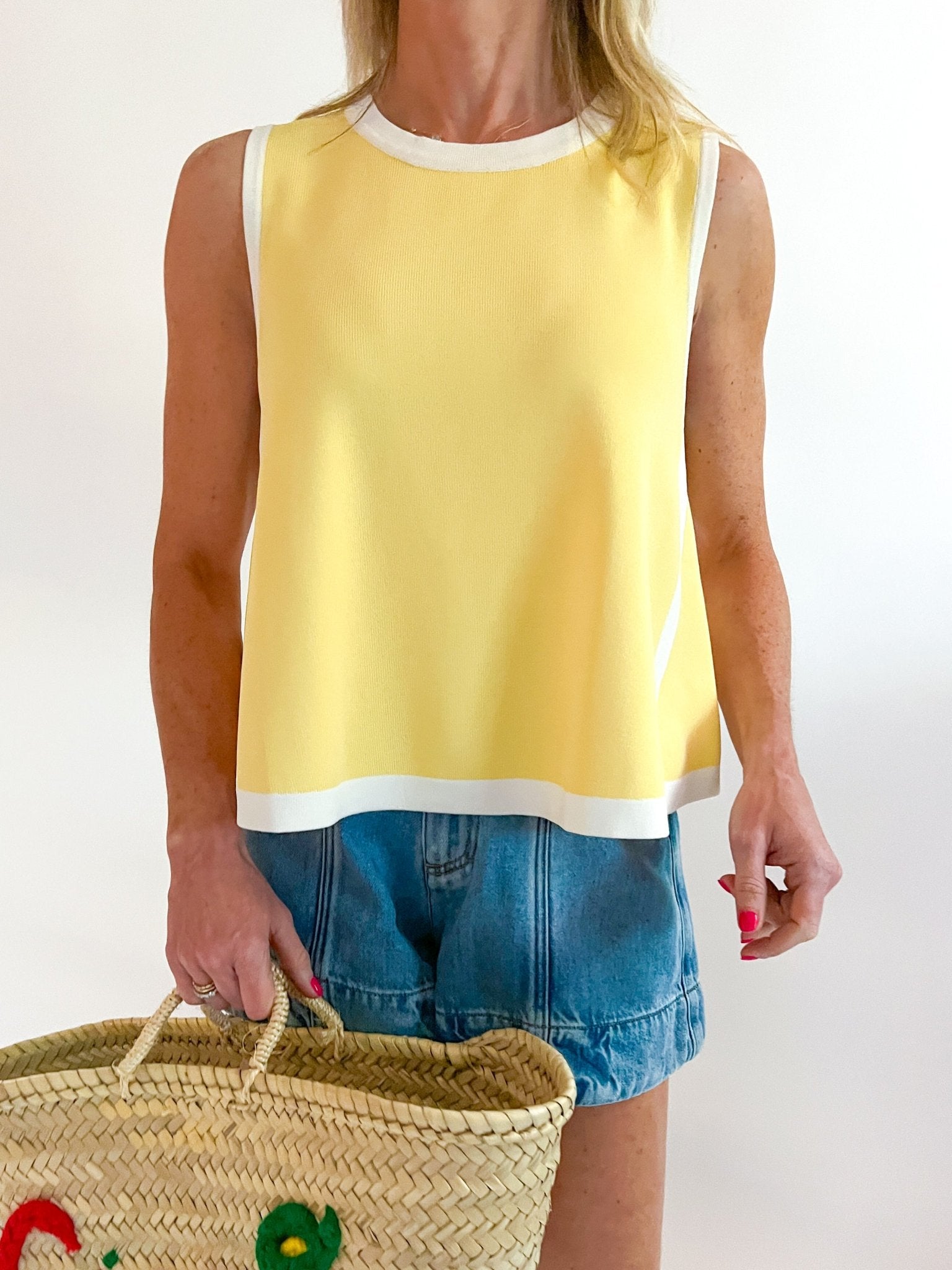 Yellow swing top with contrast trim details