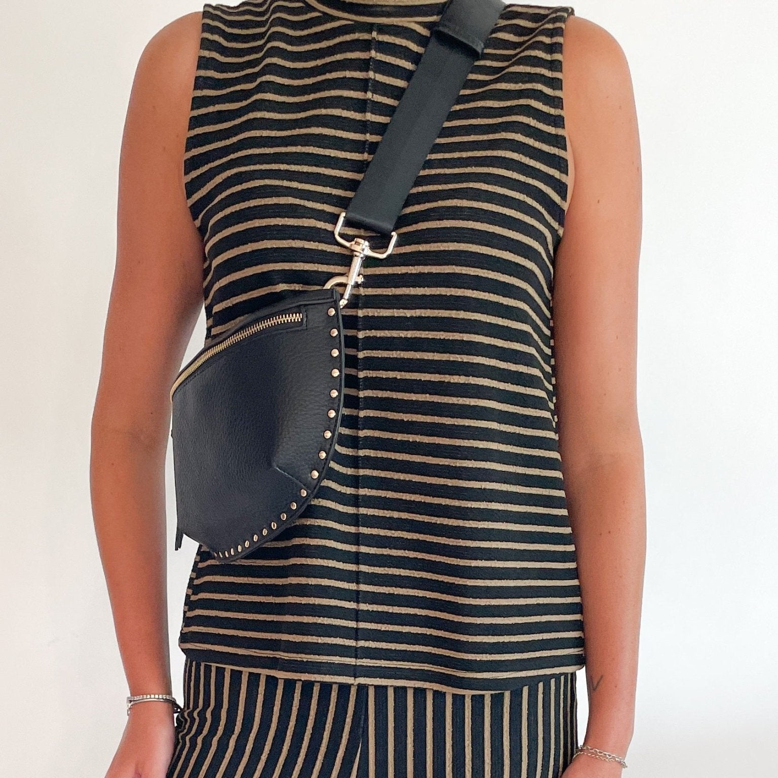 Black striped sleeveless mock neck top