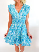 Blue border print mini dress with smocked waist