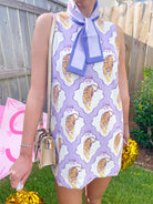 Tiger print sleeveless mini dress with scalloped frame
