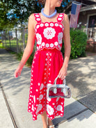Floral embroidered sleeveless top and midi skirt set