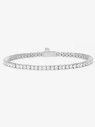 Dainty tennis bracelet with continuous row of round simulated diamonds