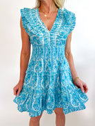 Blue border print mini dress with smocked waist