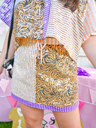 Tiger print sequin skort with striped hem