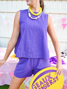 Purple sleeveless swing top and denim short set