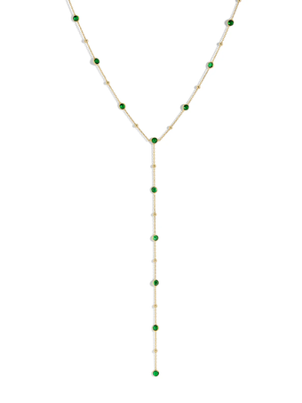 a necklace with green stones