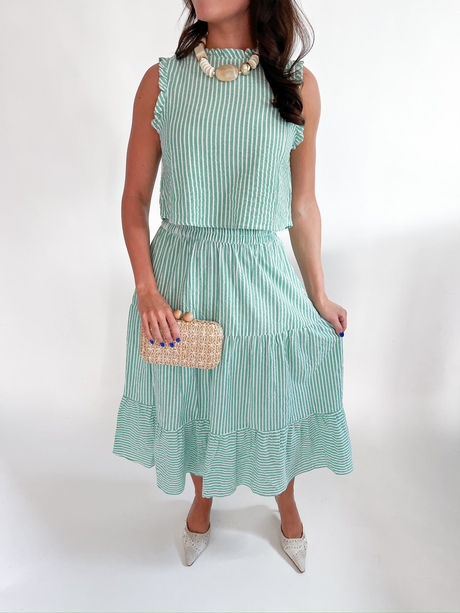 Green striped tiered midi skirt with flowy silhouette