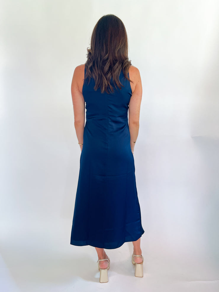 a woman in a blue dress