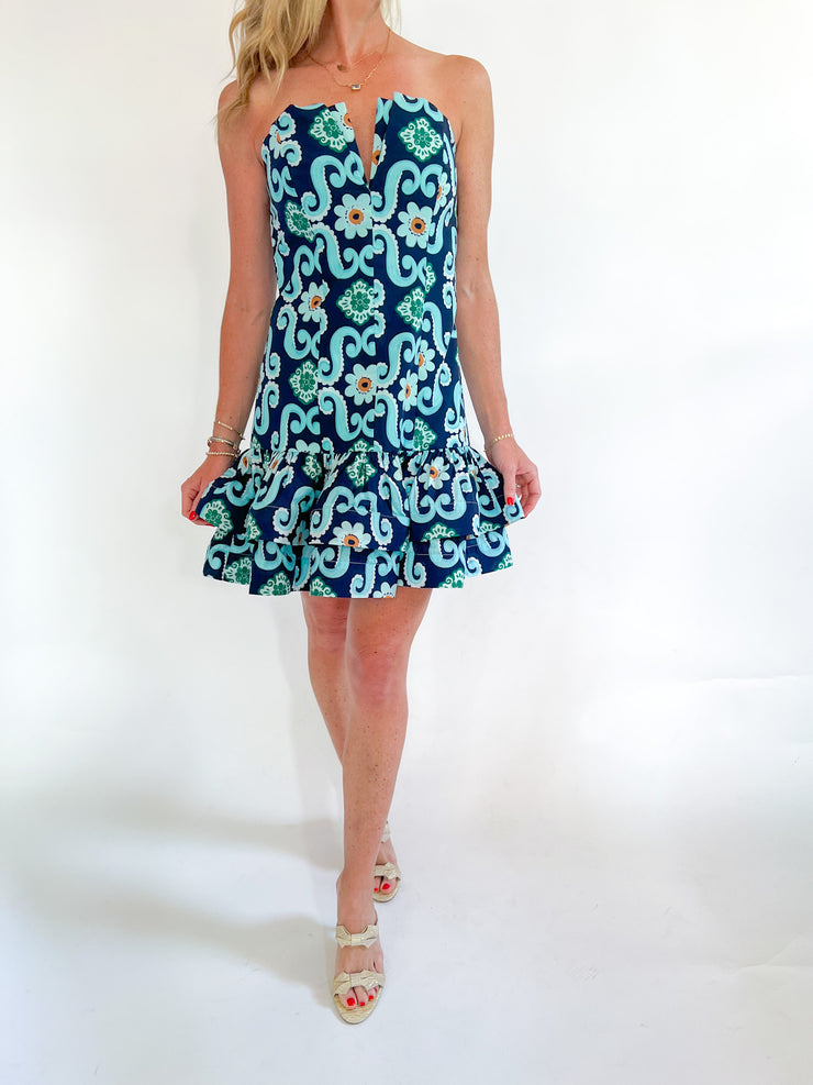 a woman in a blue dress