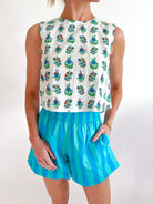 White multi botanical print crop top with fresh warm-weather design