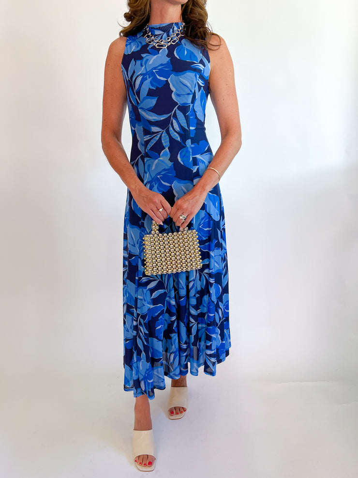 a woman in a blue dress