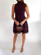 Chocolate brown mini dress with sleeveless silhouette