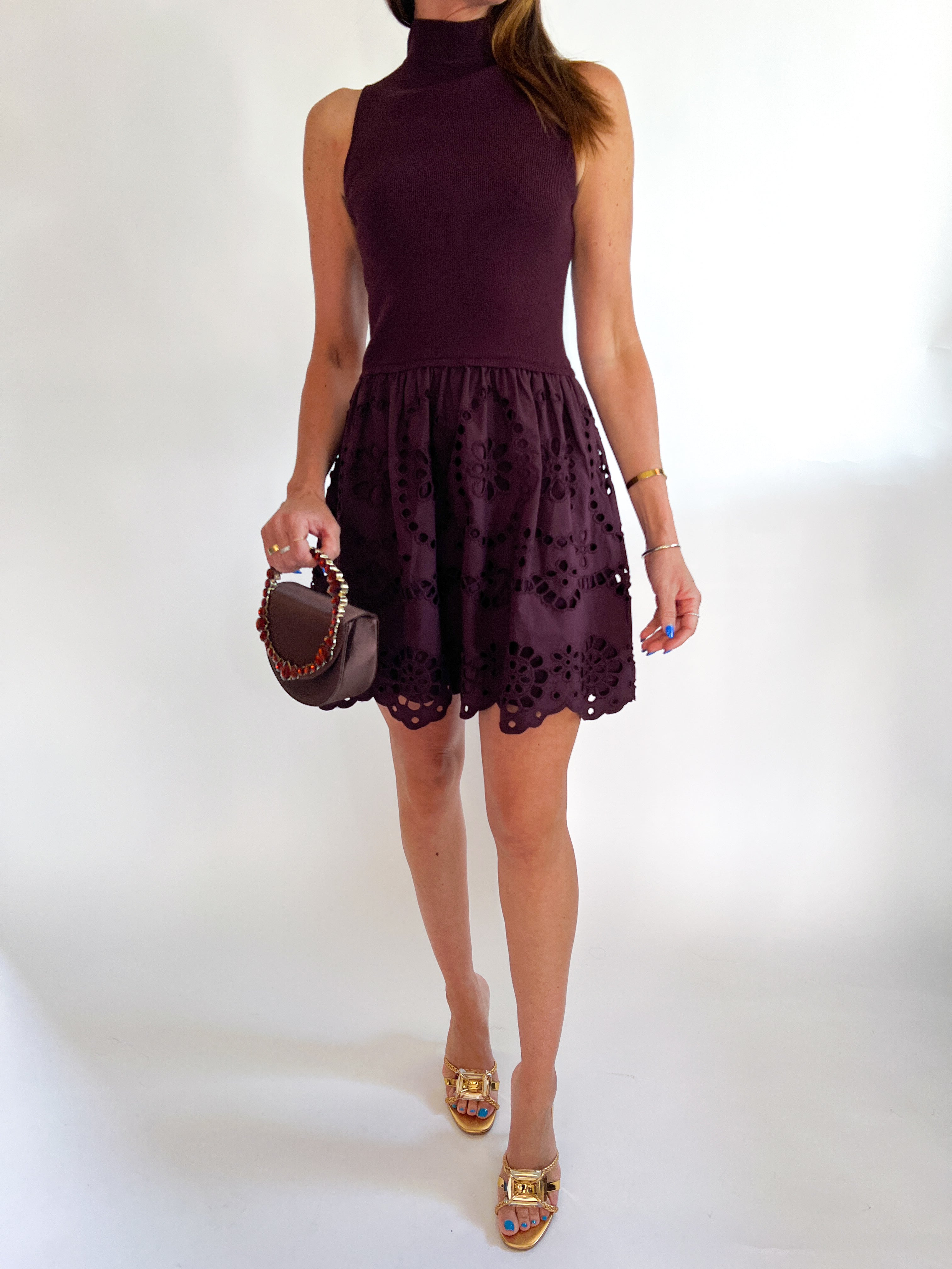 Chocolate brown mini dress with sleeveless silhouette