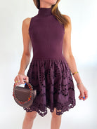 Chocolate brown mini dress with sleeveless silhouette