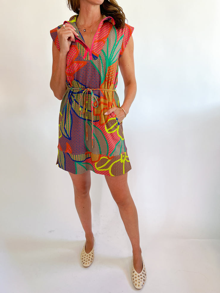 a woman in a colorful dress