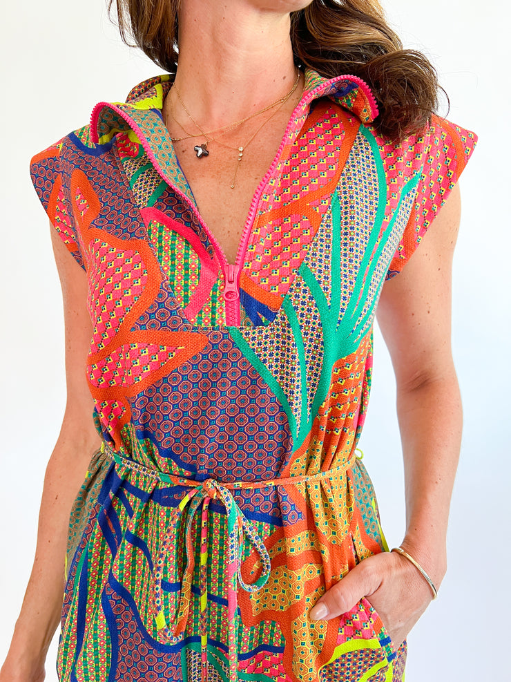 a woman wearing a colorful dress
