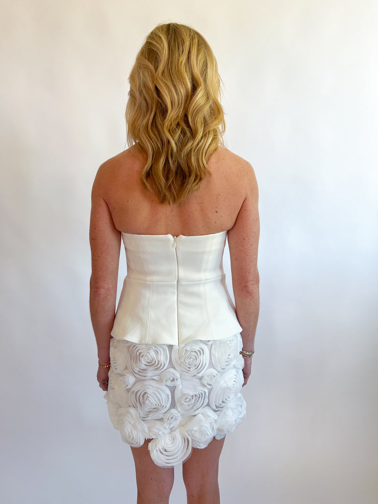 a woman in a white dress