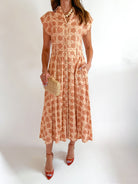Tan mosaic print midi dress with button front and cap sleeves