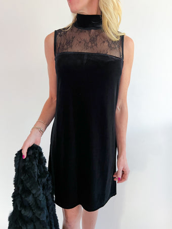 a woman in a black dress