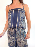 Blue animal print sleeveless top with contrast border