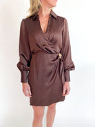 Brown satin wrap mini dress with long sleeves