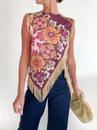 Wine sleeveless top with asymmetrical fringe cross front
