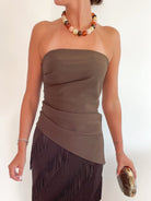 Brown bandeau top with asymmetric hem