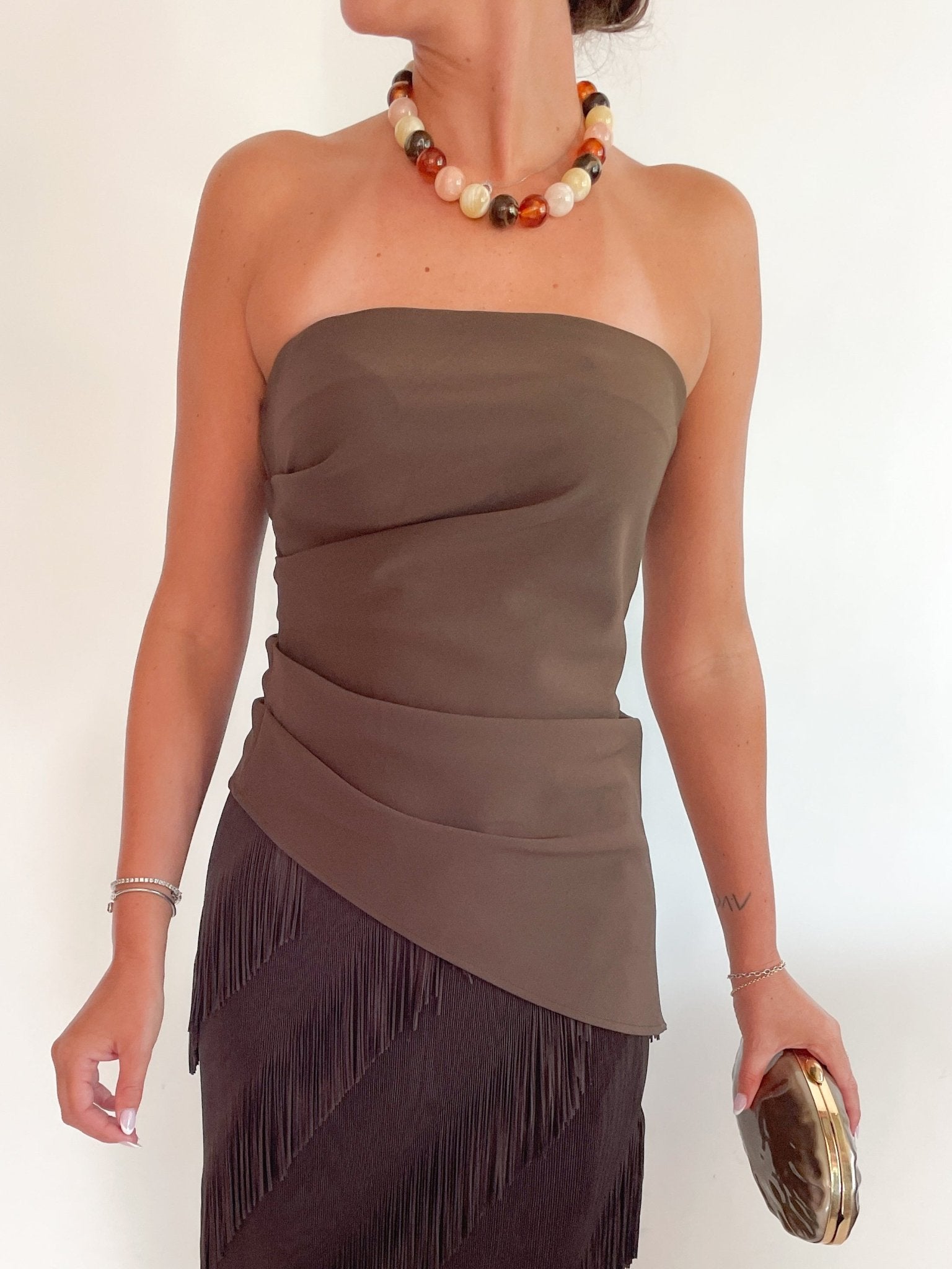 Brown bandeau top with asymmetric hem