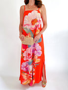Floral sleeveless maxi dress with vibrant oversized print