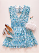 Blue border print mini dress with smocked waist
