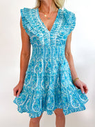 Blue border print mini dress with smocked waist