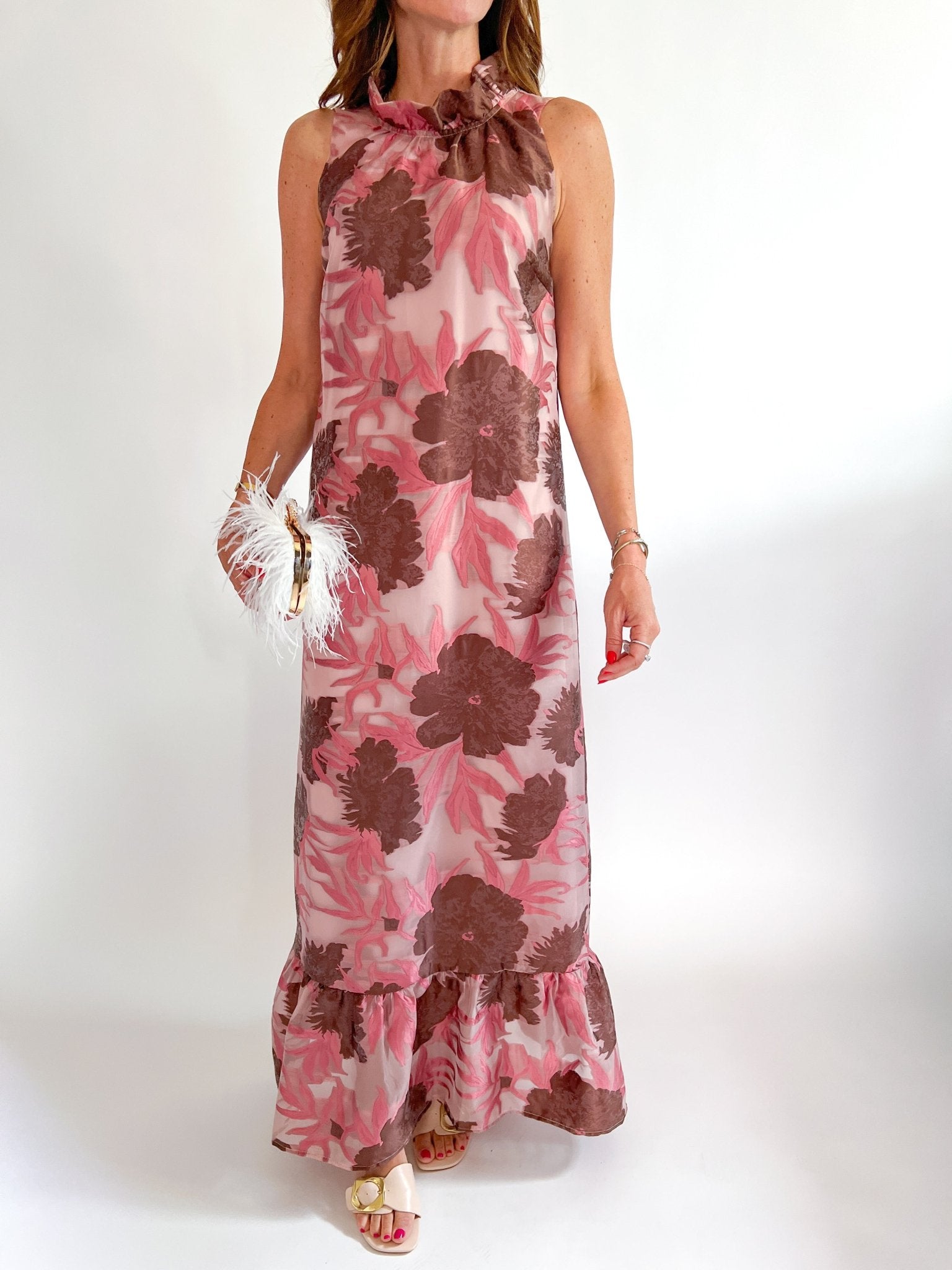 Pink floral maxi gown with high neckline and ruffle hem