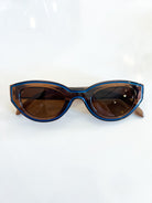 Brown cat-eye sunglasses with vintage-inspired silhouette