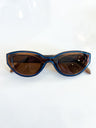 Brown cat-eye sunglasses with vintage-inspired silhouette