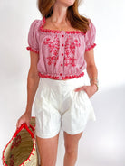 Cecilia Shirt by WE ARE SUNDAYS in red gingham with puff sleeves and floral detail