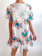 Floral crochet lace mini dress with delicate trim