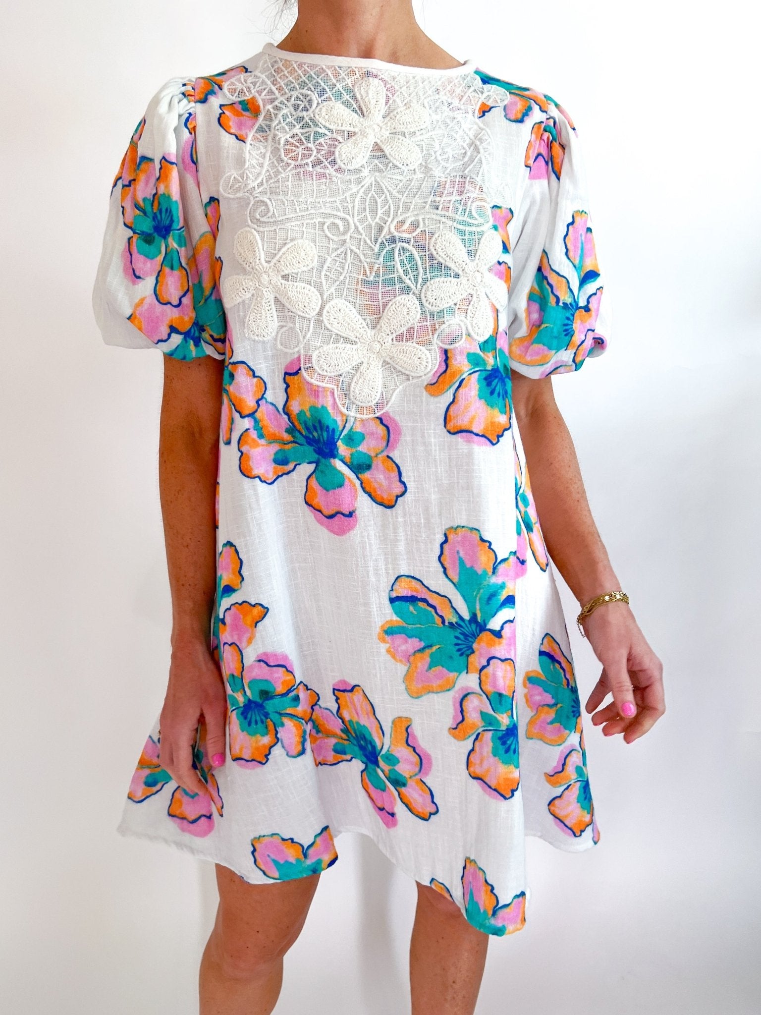 Floral crochet lace mini dress with delicate trim