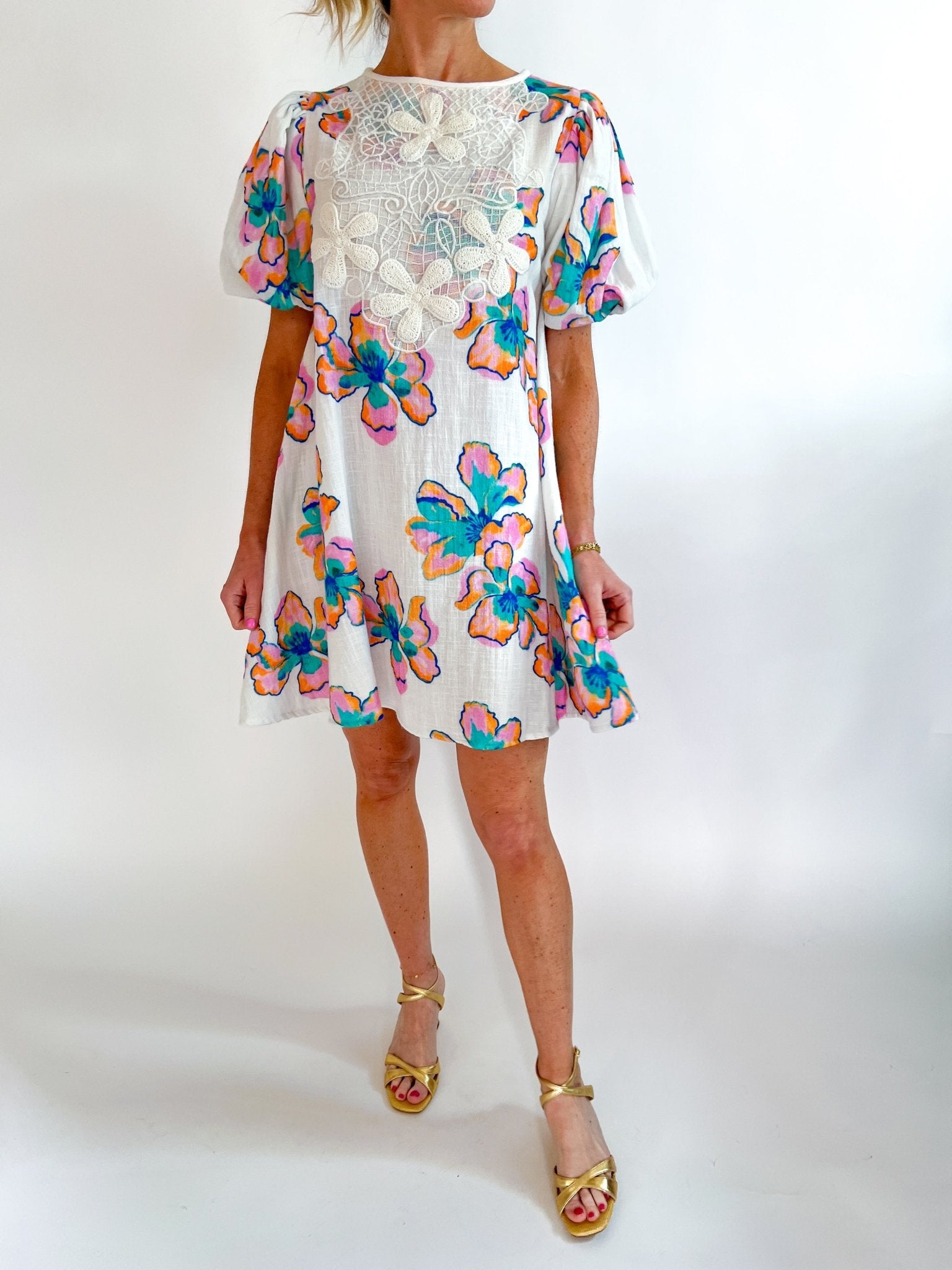 Floral crochet lace mini dress with delicate trim