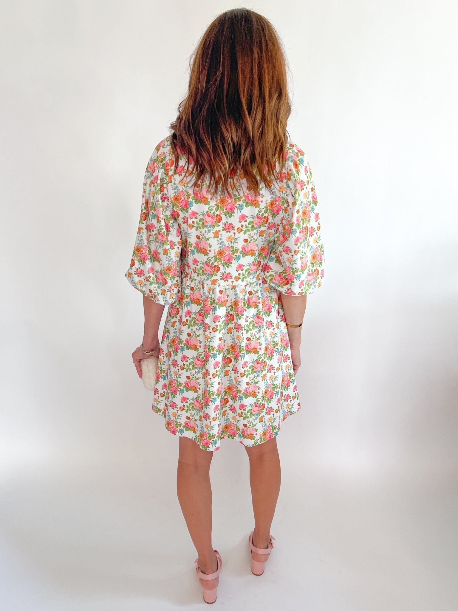 Floral mini dress with long sleeve collared neckline