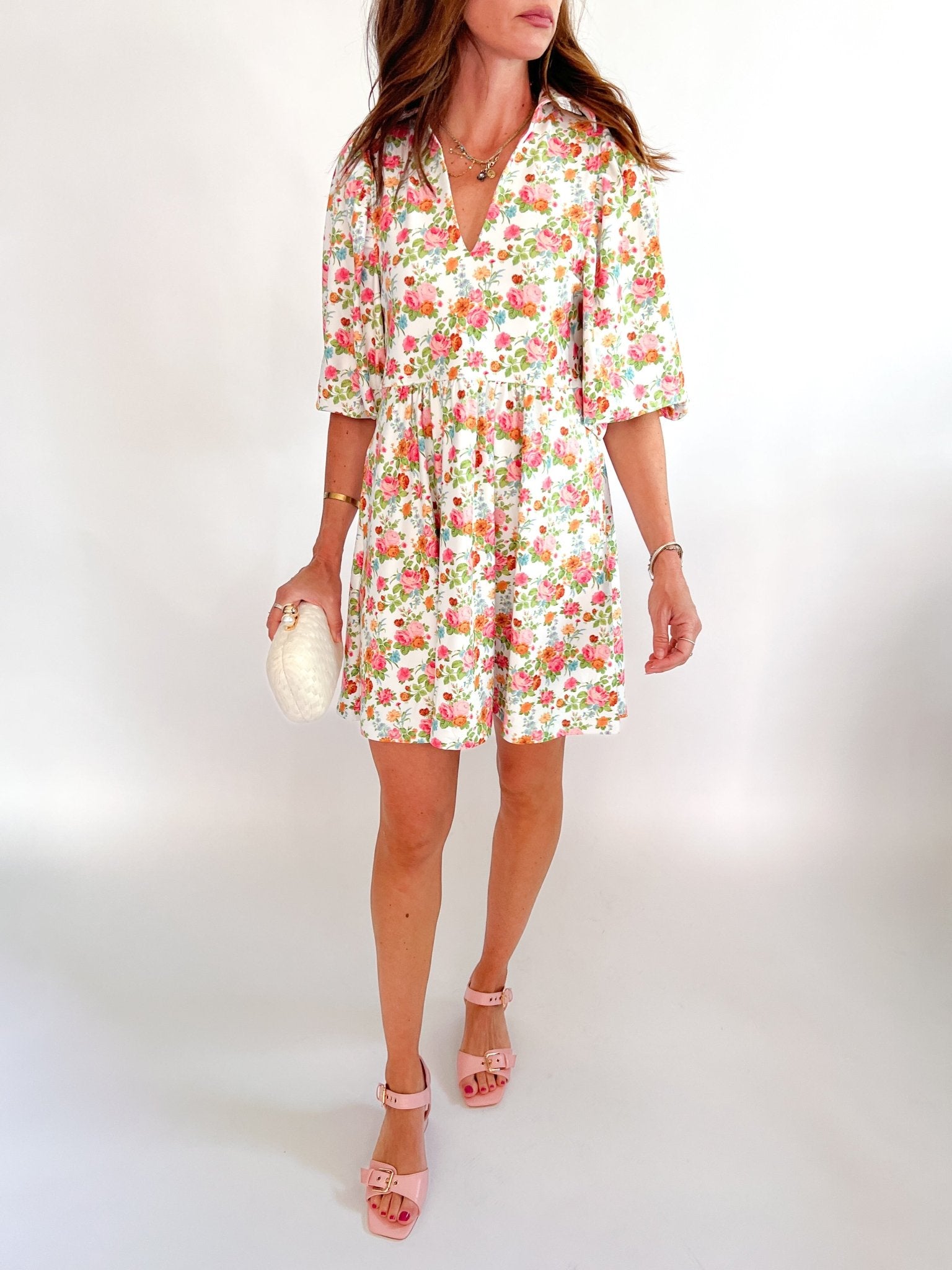 Floral mini dress with long sleeve collared neckline