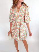 Floral mini dress with long sleeve collared neckline