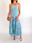 Blue floral strapless midi dress with peplum waist