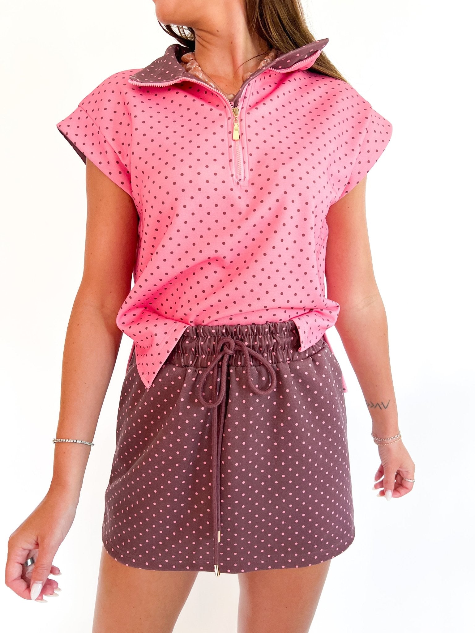 Multi polka dot quarter zip top