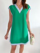 Green shift mini dress with white contrast trim