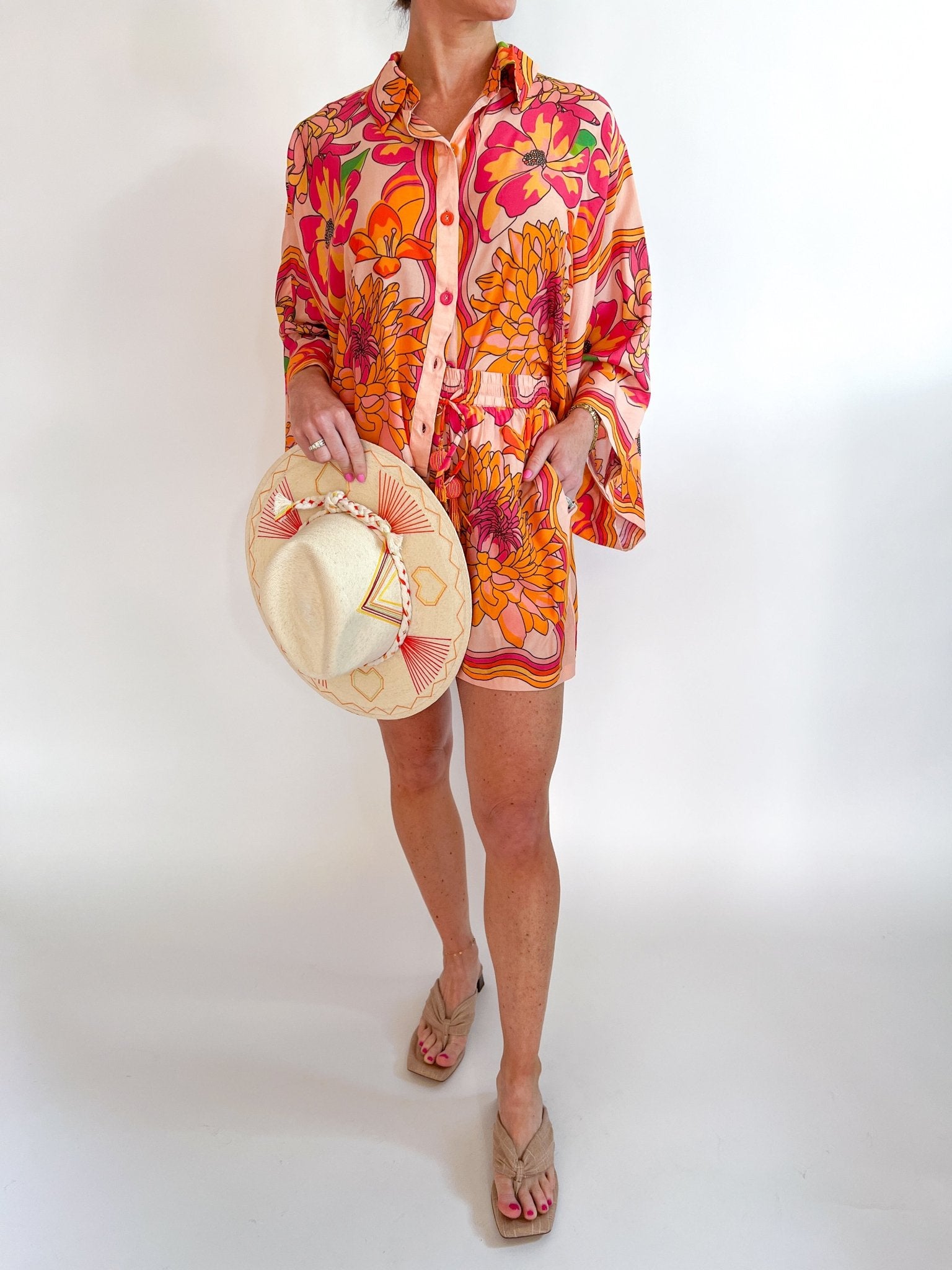 Floral drawstring shorts with tassel details